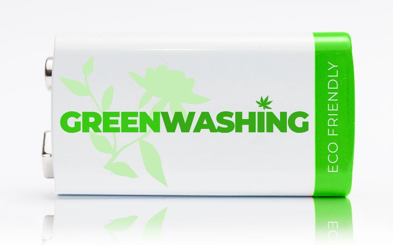 Batterie in grün-weiß mit der Aufschrift Greenwashing